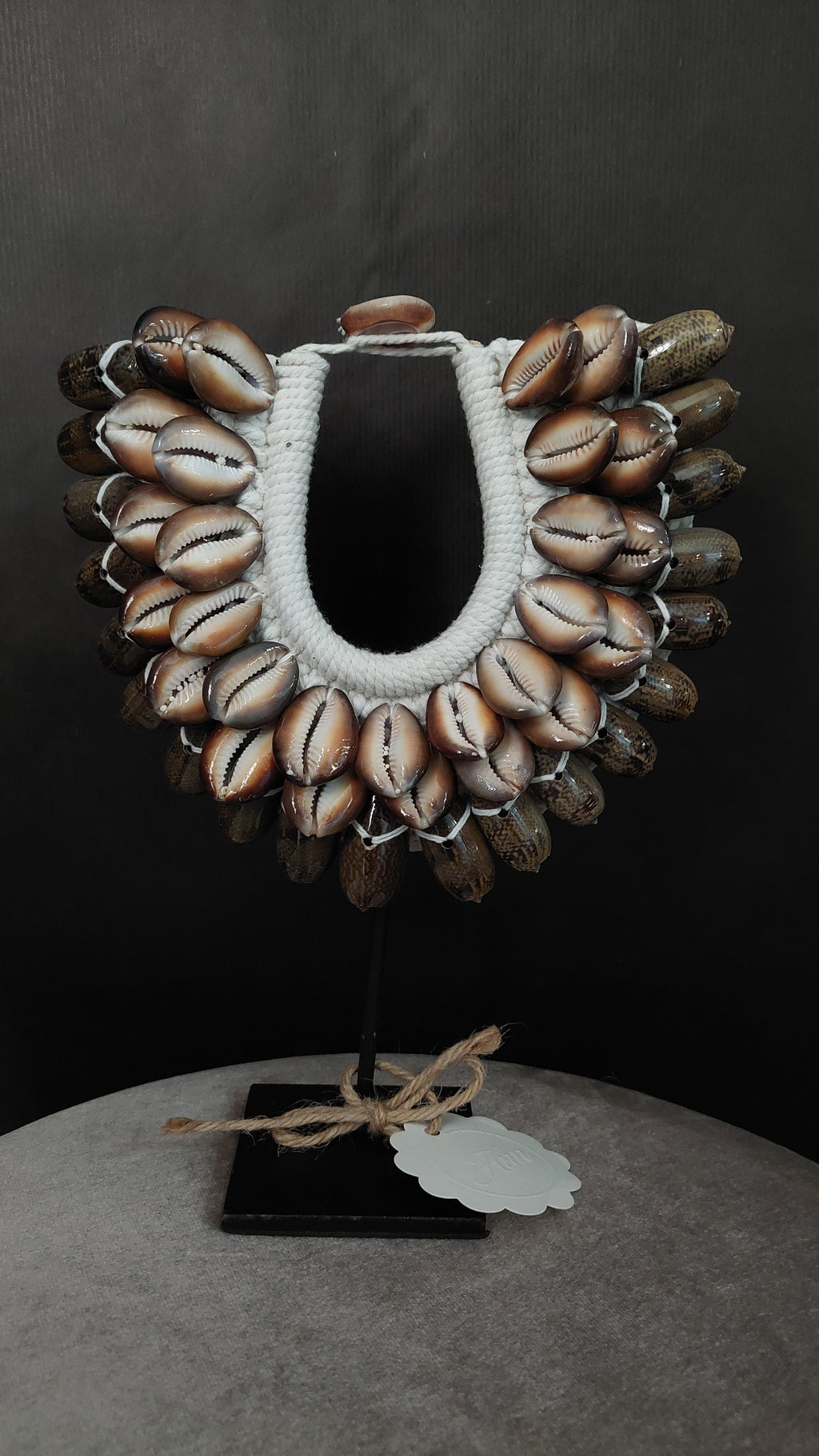 Half schelpenornament bruin/beige